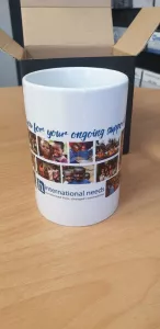 International Needs Coffee Cup_Pure Print Promotions Tauranga.jpg