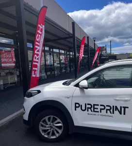 Furnish   Footpath   Flags   Signage     Pure   Print   Promotions   Tauranga   Printer